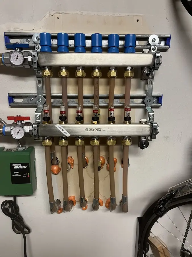 Plumber performing Gas Line Installation at a residential property in Wendell